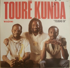 MP3 - ( Mbalax) - Touré Kunda – Toubab Bi ~ Full Album Titres
 
A1 - Okunaya 5:12
A2 - Wadini 4:20
A3 - Nagaana 5:22
A4 - Karadindi 5:10

B1 - Toubab Bi 4:10
B2 - Wet 4:33
B3 - Nanso 3:52
B4 - Baara 4:10
B5 - Mamadiyo 3 : 25




