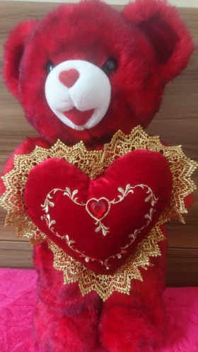 Nounours Teddy Love  Voici un somptueux ours en peluche "Teddy Love" pour faire passer votre message d